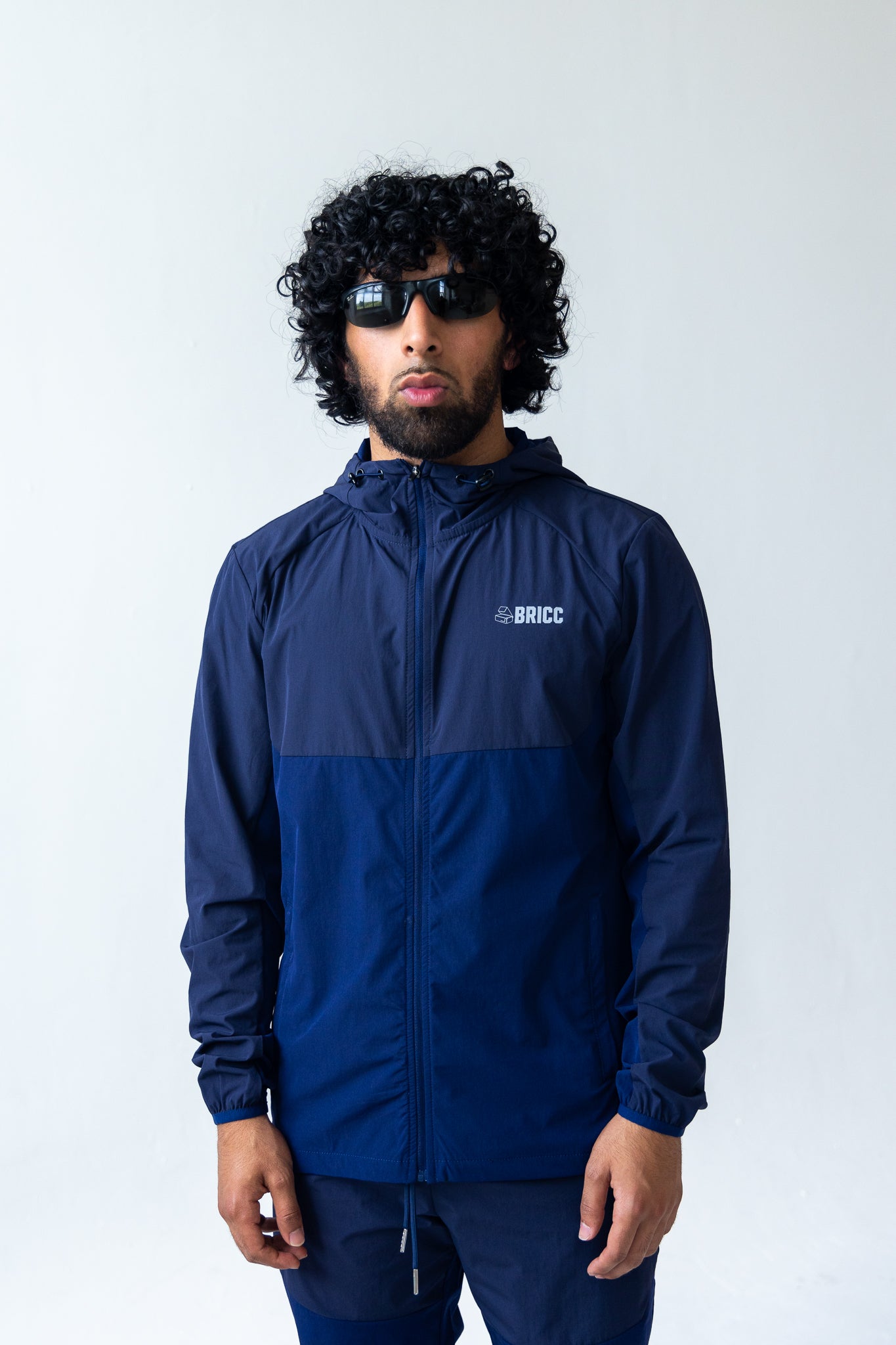 Navy BRICC Windbreaker